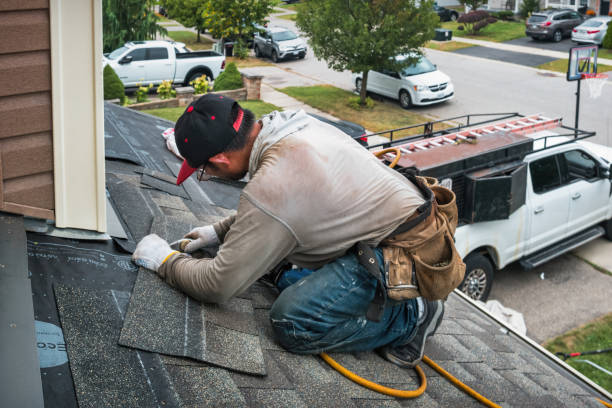 Professional Roof Leak Repair technician working in Chester, VT